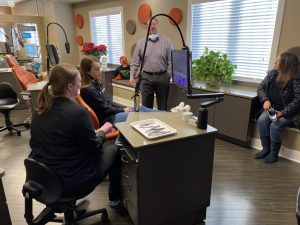 Dr. Skopek of Skopek Orthodontics having a conversation with Chynna and their patients