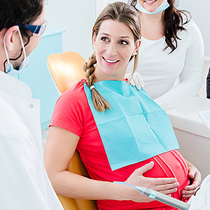 Skopek Orthodontics pregnant woman visiting for a check-up
