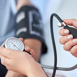 Skopek Orthodontics checking patient's blood pressure
